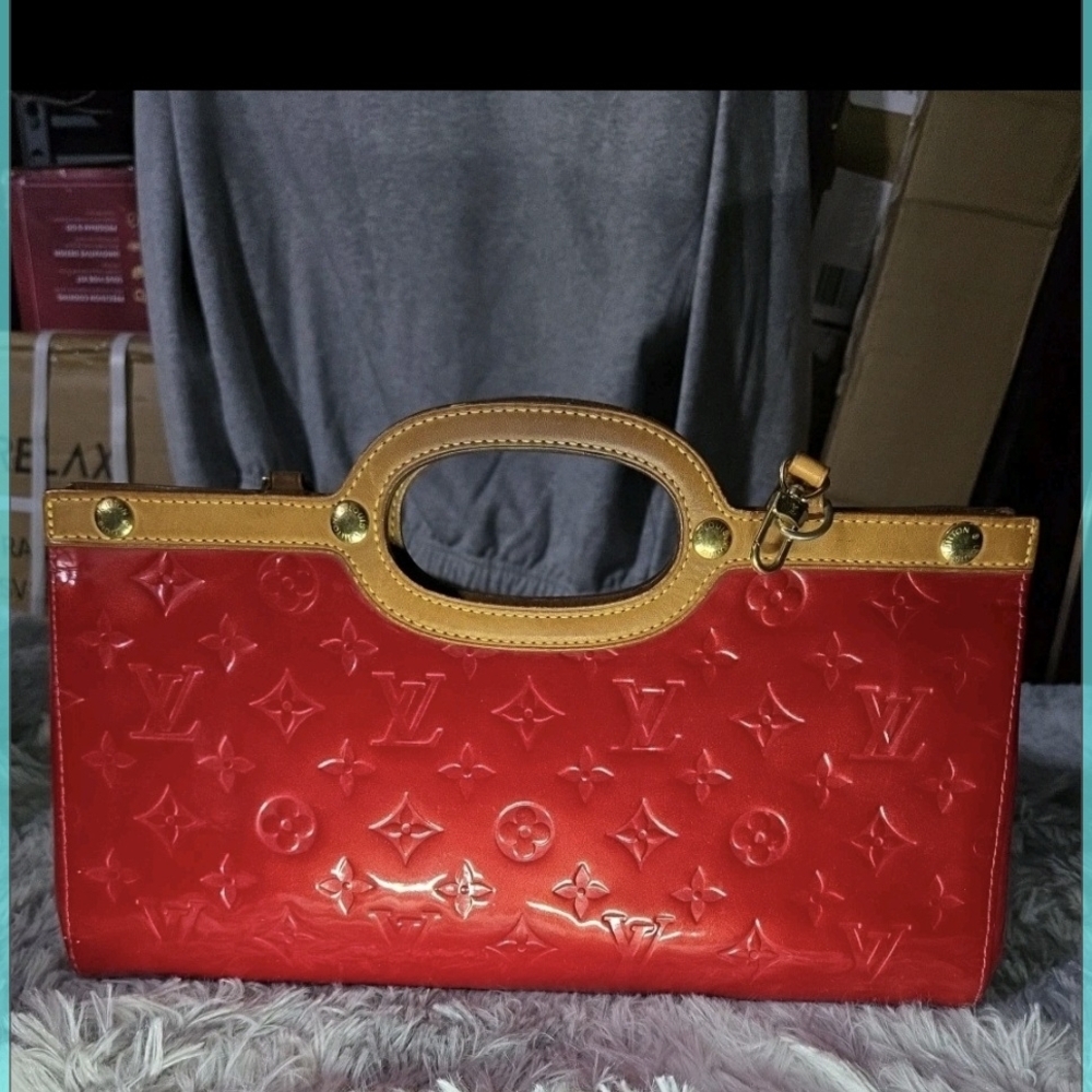 Louis Vuitton Red Enamel Logo Clutch Bag